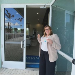 a woman standing in an open doorway