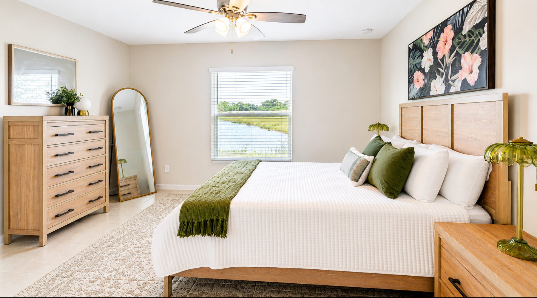 a bedroom with a bed and two nightstands